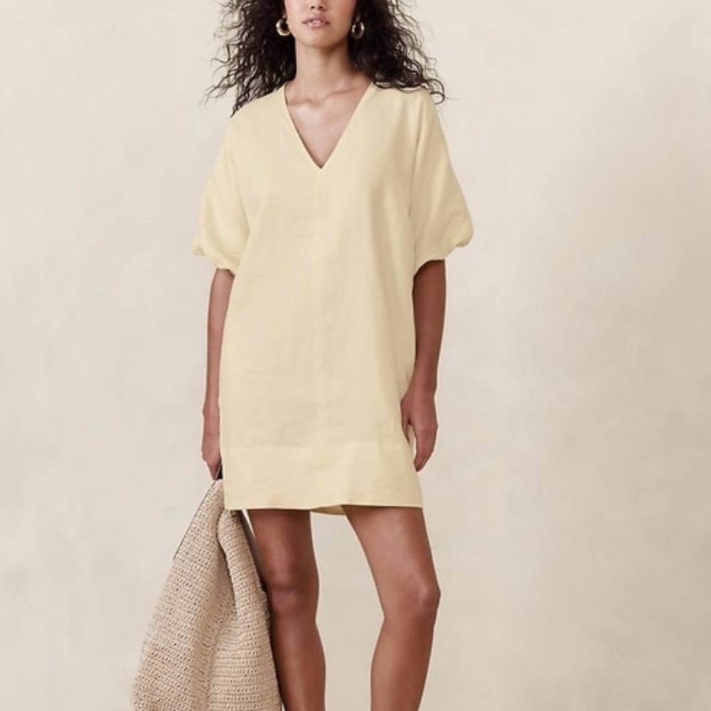 Elegant buttercream yellow v-neck dress